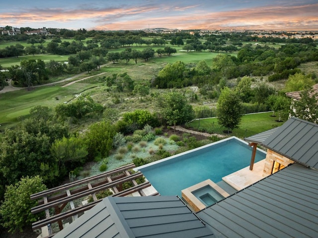 12625 Maidenhair Ln Unit 32, Austin, TX 78738 - pool at dusk with view of golf course