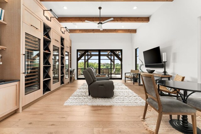 12625 Maidenhair Ln Unit 32, Austin, TX 78738 - living area with beam ceiling, light wood-style flooring, recessed lighting, and wine cooler