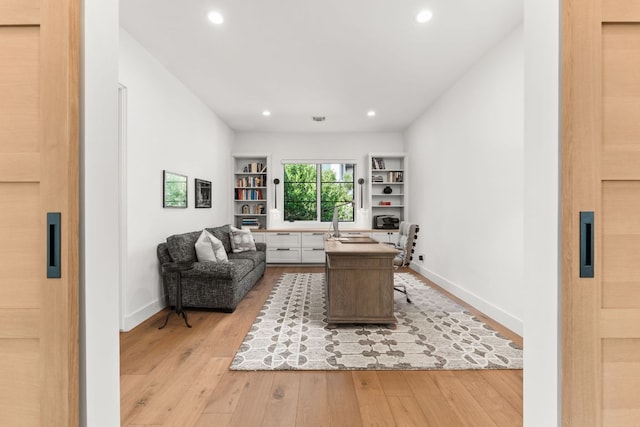 12625 Maidenhair Ln Unit 32, Austin, TX 78738 - home office featuring light wood-style floors, recessed lighting, and baseboards