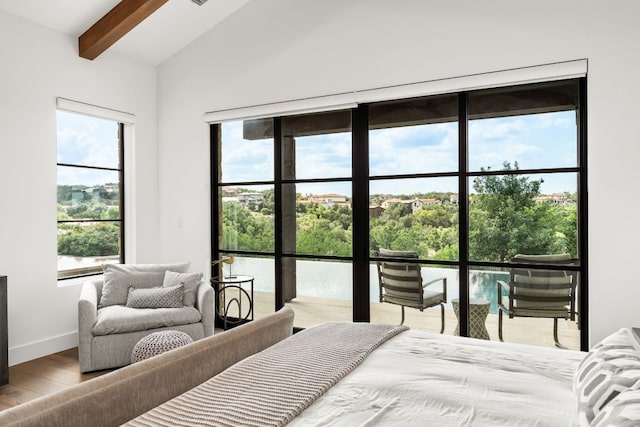 12625 Maidenhair Ln Unit 32, Austin, TX 78738 - bedroom featuring wood finished floors and baseboards