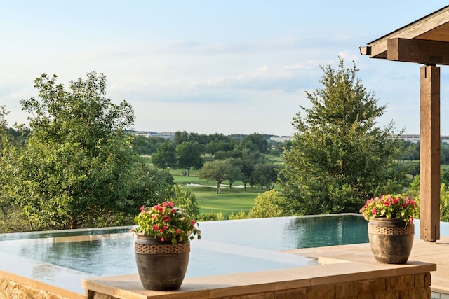 12625 Maidenhair Ln Unit 32, Austin, TX 78738 - view of pool featuring an infinity pool