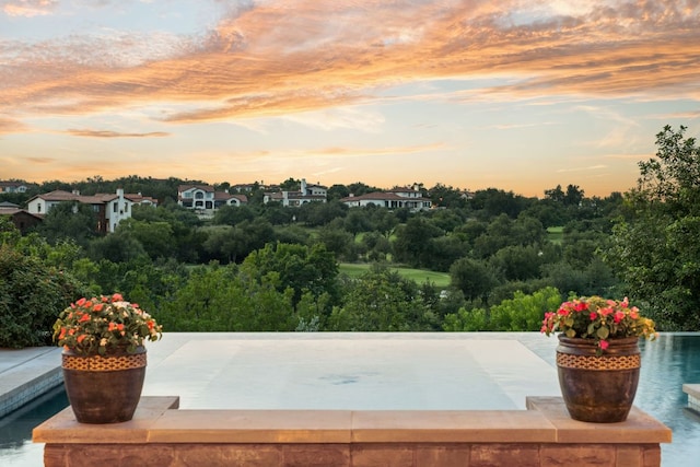 12625 Maidenhair Ln Unit 32, Austin, TX 78738 - view of swimming pool featuring view of wooded area