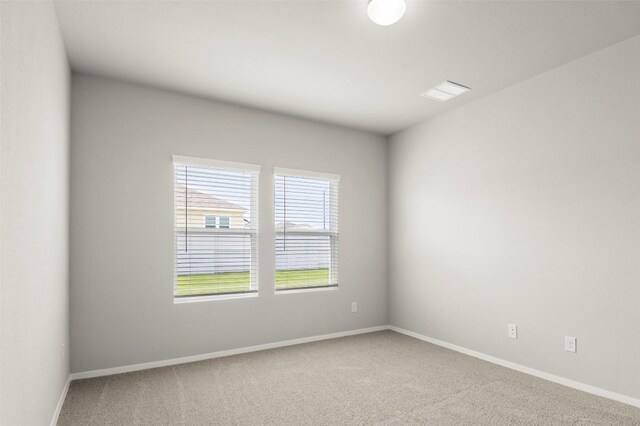 246 Barley Ln, Elgin, TX 78621 - carpeted spare room featuring baseboards