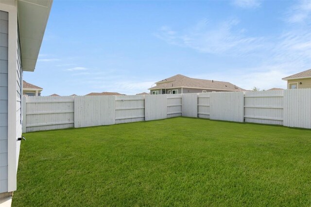 246 Barley Ln, Elgin, TX 78621 - view of fenced backyard