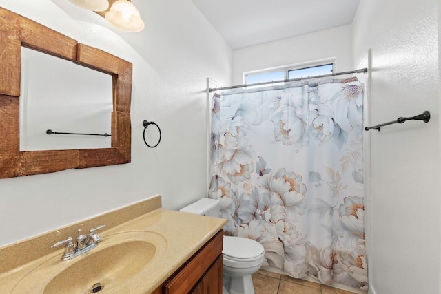 221 Mcgarity St, Kyle, TX 78640 - bathroom with vanity, toilet, and tile patterned floors