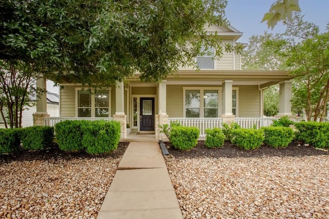 221 Mcgarity St, Kyle, TX 78640 - view of front of house with a porch