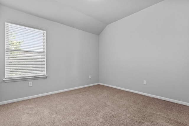 1913 Gabrielles Way, Manchaca, TX 78652 - spare room featuring carpet, lofted ceiling, and baseboards