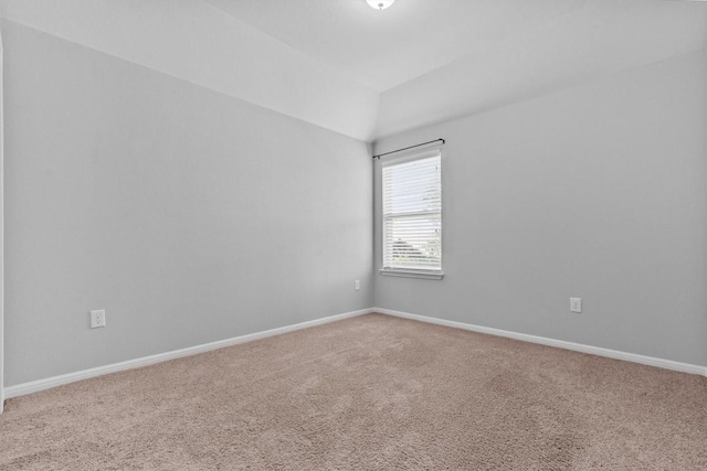 1913 Gabrielles Way, Manchaca, TX 78652 - spare room featuring carpet, baseboards, and lofted ceiling