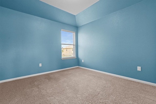 1913 Gabrielles Way, Manchaca, TX 78652 - spare room with carpet floors, baseboards, and lofted ceiling