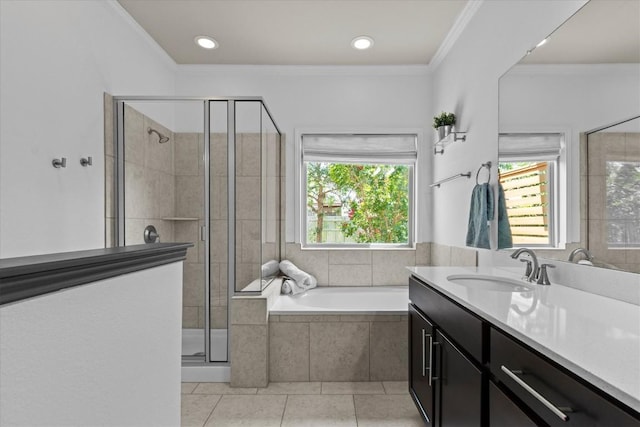 1913 Gabrielles Way, Manchaca, TX 78652 - bathroom with a shower stall, vanity, a garden tub, tile patterned flooring, and crown molding
