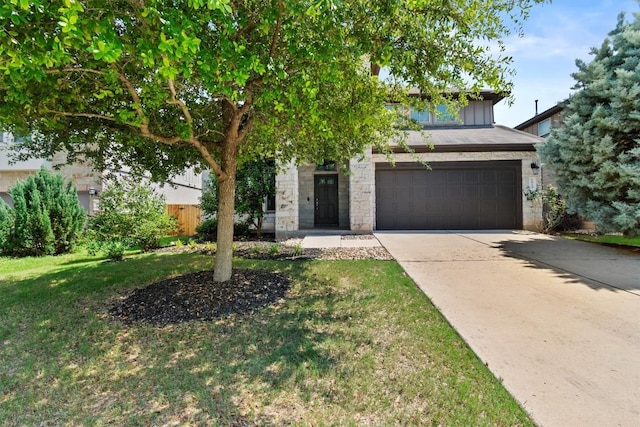 1913 Gabrielles Way, Manchaca, TX 78652 - view of front facade with concrete driveway, a garage, a front lawn, stone siding, and board and batten siding