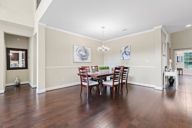 2337 Centennial Loop, Round Rock, TX 78665 - dining room with dark wood-style floors, baseboards, crown molding, and a chandelier