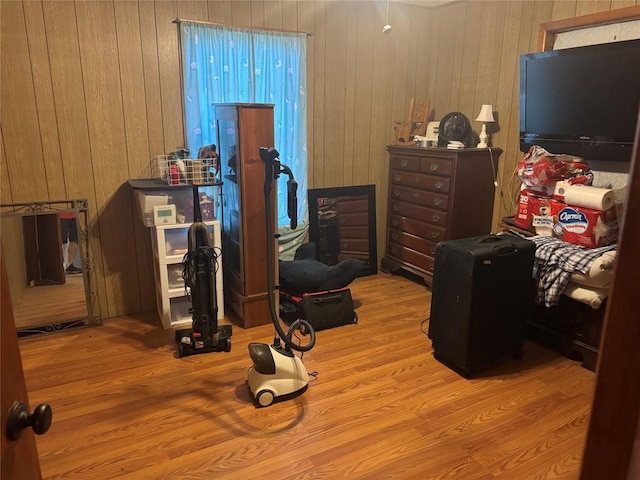 137 N Kowald Ln, New Braunfels, TX 78130 - bedroom with wood walls and wood finished floors