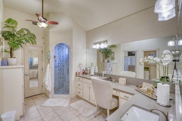 104 Mason Ct, Horseshoe Bay, TX 78657 - full bath featuring vanity, tile patterned flooring, ceiling fan, a stall shower, and high vaulted ceiling