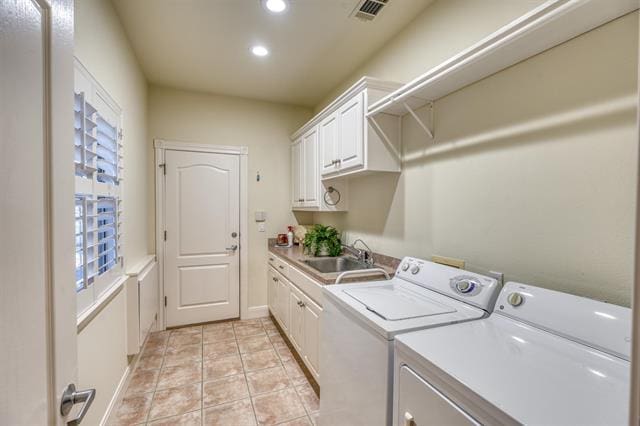 104 Mason Ct, Horseshoe Bay, TX 78657 - washroom featuring washing machine and clothes dryer, plenty of natural light, cabinet space, recessed lighting, and baseboards