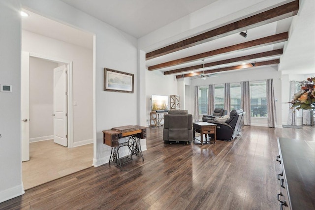 3113 Capra Cv, Round Rock, TX 78665 - living room with beamed ceiling, a ceiling fan, dark wood finished floors, and baseboards