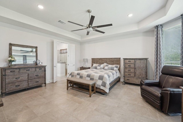 3113 Capra Cv, Round Rock, TX 78665 - bedroom featuring a tray ceiling, multiple windows, recessed lighting, ceiling fan, and light tile patterned flooring
