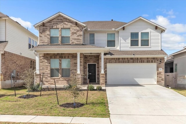 308 Castlefields St, Hutto, TX 78634 - view of front of house featuring an attached garage, brick siding, driveway, and a shingled roof