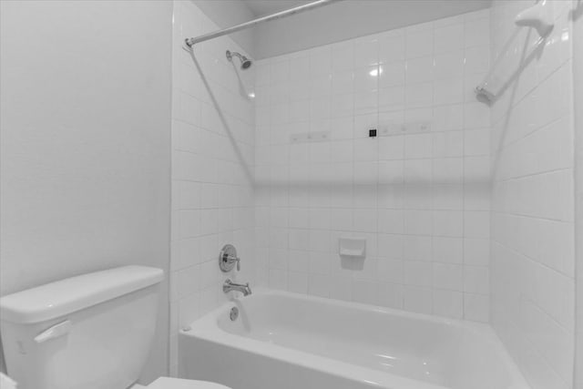 308 Castlefields St, Hutto, TX 78634 - bathroom featuring toilet and washtub / shower combination