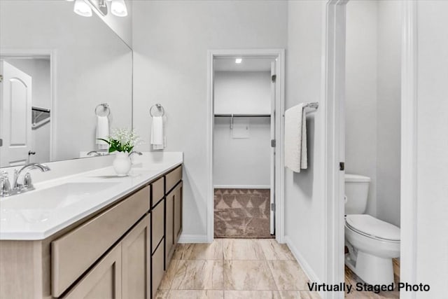 308 Castlefields St, Hutto, TX 78634 - full bathroom featuring double vanity and a spacious closet