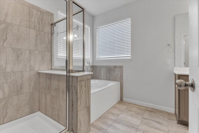 308 Castlefields St, Hutto, TX 78634 - full bath featuring a shower stall, a garden tub, and vanity