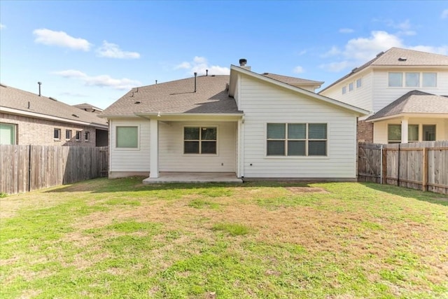 308 Castlefields St, Hutto, TX 78634 - rear view of house featuring a fenced backyard and a patio