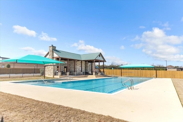 308 Castlefields St, Hutto, TX 78634 - community pool with a patio area