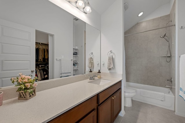 311 Spiny Lizard Ln, San Marcos, TX 78666 - full bathroom with vanity, toilet, tile patterned flooring, shower / bathtub combination, and a walk in closet