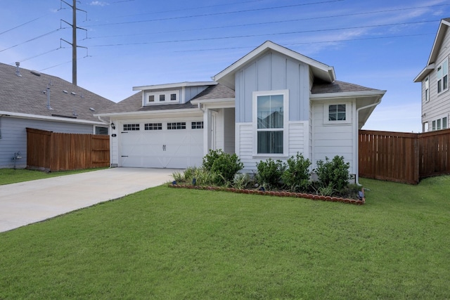 311 Spiny Lizard Ln, San Marcos, TX 78666 - view of front of home with board and batten siding, driveway, an attached garage, and roof with shingles