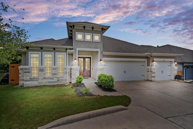 7813 Barbary Ct, Austin, TX 78744 - view of front facade featuring stone siding, an attached garage, concrete driveway, and french doors