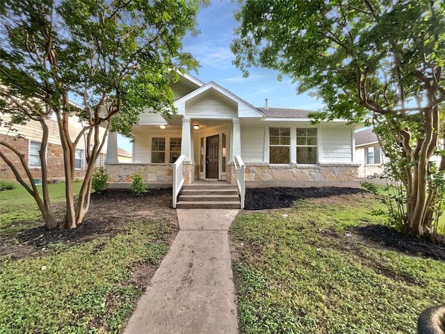 18132 Great Basin Ave, Pflugerville, TX 78660 - view of front of house featuring stone siding and covered porch