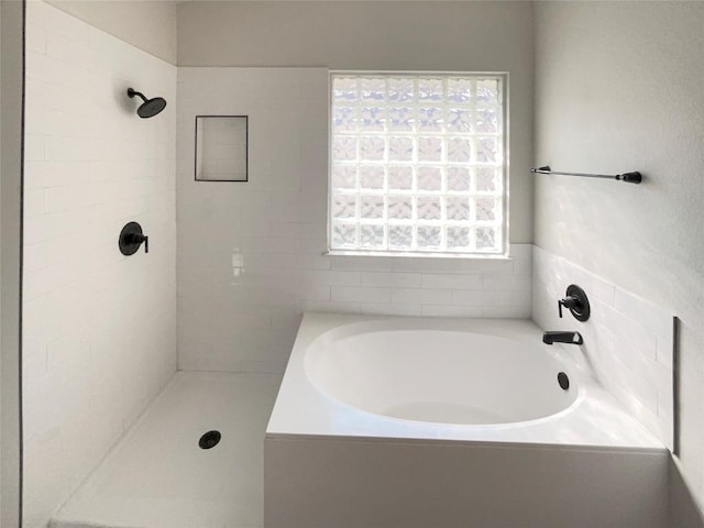 18132 Great Basin Ave, Pflugerville, TX 78660 - full bathroom featuring a garden tub and a tile shower