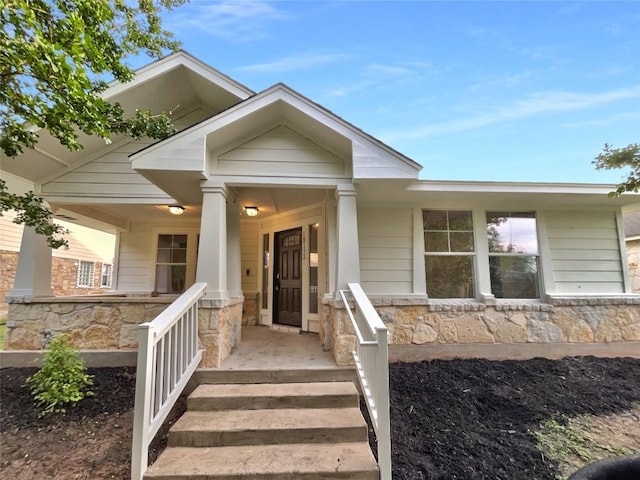 18132 Great Basin Ave, Pflugerville, TX 78660 - view of front of house featuring stone siding and a porch