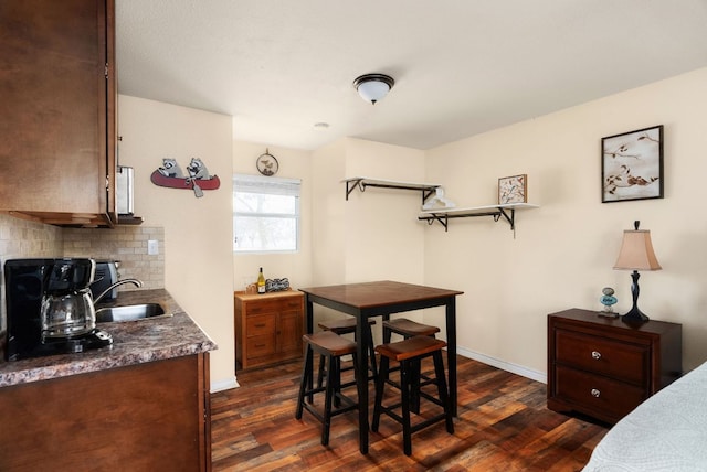 235 El Camino River Rd, Bastrop, TX 78602 - dining room featuring dark wood-style floors