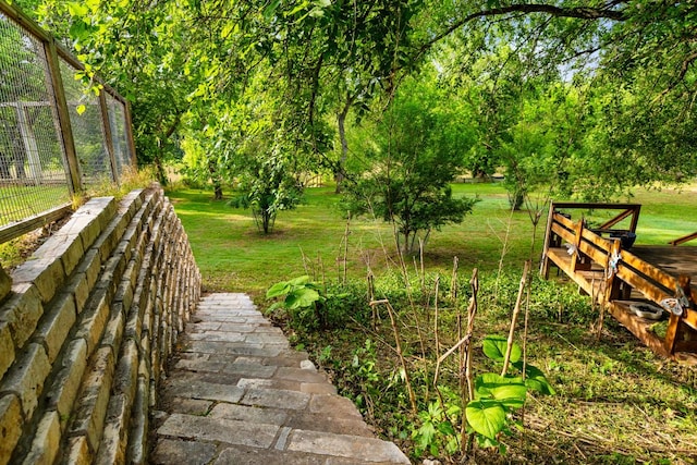 235 El Camino River Rd, Bastrop, TX 78602 - view of property's community with a yard