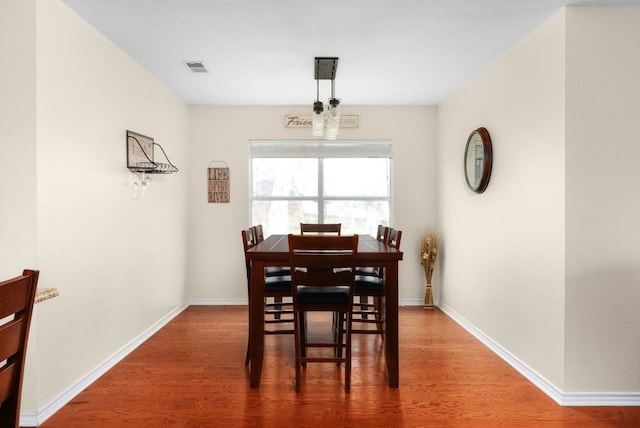 235 El Camino River Rd, Bastrop, TX 78602 - dining room featuring wood finished floors