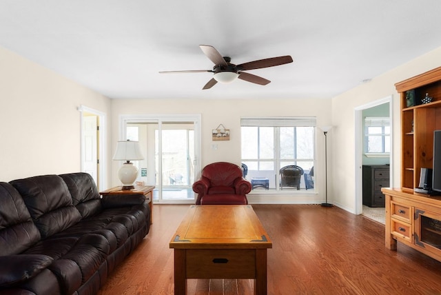 235 El Camino River Rd, Bastrop, TX 78602 - living area with wood finished floors and a ceiling fan