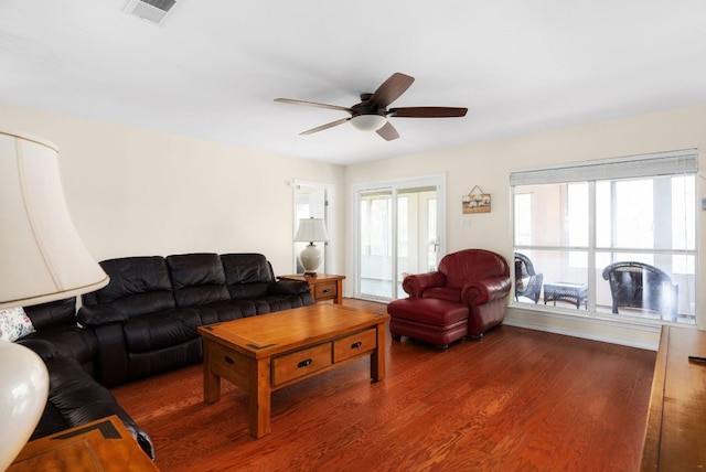 235 El Camino River Rd, Bastrop, TX 78602 - living room with wood finished floors and a ceiling fan