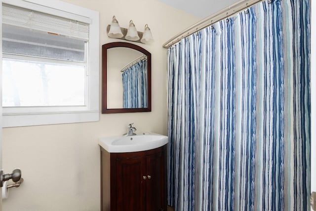 235 El Camino River Rd, Bastrop, TX 78602 - full bath with vanity and a shower with shower curtain