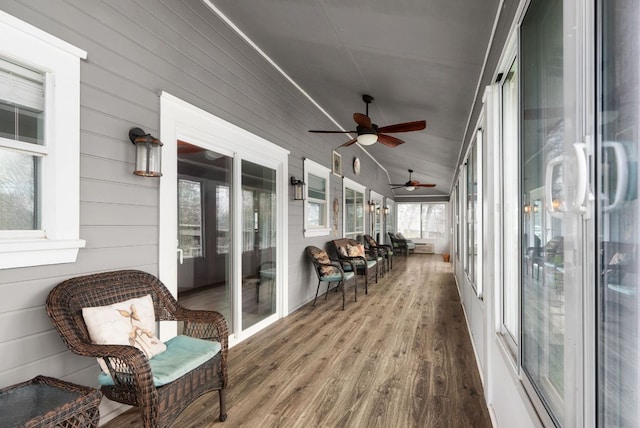 235 El Camino River Rd, Bastrop, TX 78602 - sunroom / solarium featuring wood finished floors, a ceiling fan, and vaulted ceiling
