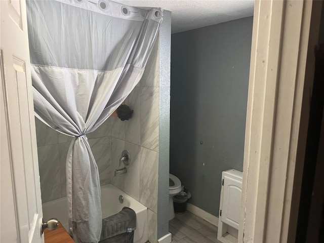 142 N Kowald Ln, New Braunfels, TX 78130 - bathroom featuring toilet and shower / bath combination with curtain