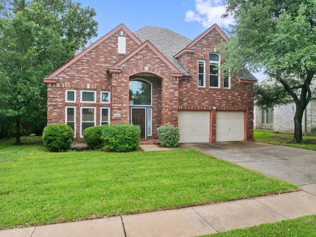 16803 Black Kettle Dr, Leander, TX 78641 - traditional-style house featuring brick siding, an attached garage, a front yard, concrete driveway, and a shingled roof