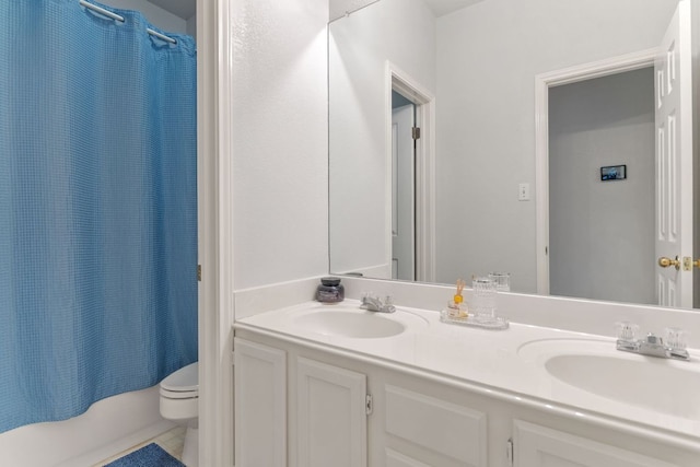 16803 Black Kettle Dr, Leander, TX 78641 - bathroom featuring toilet and double vanity