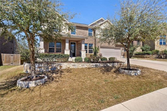 8508 Lookout Cliff Pass, Austin, TX 78737 - view of front facade featuring brick siding, driveway, and a garage