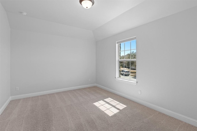 8508 Lookout Cliff Pass, Austin, TX 78737 - spare room with light colored carpet, baseboards, lofted ceiling, and a smoke detector