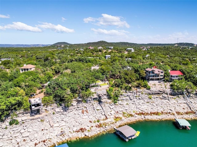 14753 Arrowhead Dr, Austin, TX 78641 - drone / aerial view of a nearby body of water and a heavily wooded area