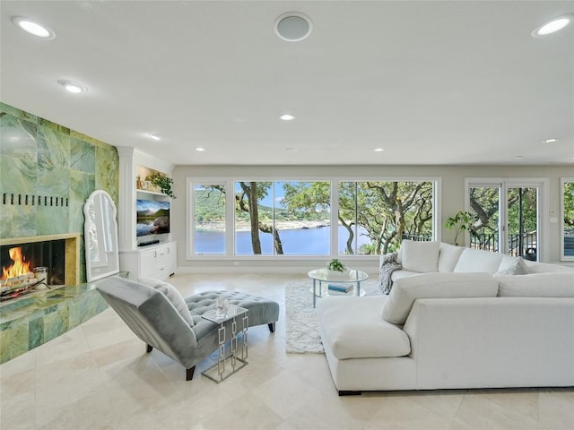 14753 Arrowhead Dr, Austin, TX 78641 - living area with healthy amount of natural light, recessed lighting, and a fireplace