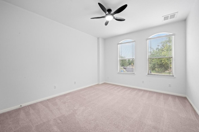 8328 Alophia Dr, Austin, TX 78739 - spare room with light carpet, ceiling fan, and baseboards