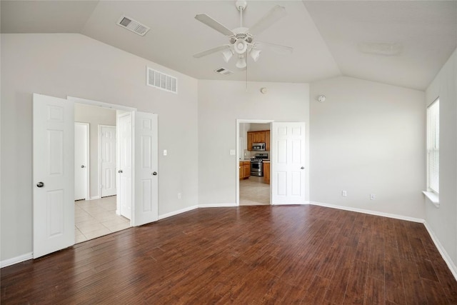 728 Stokesay Castle Path, Pflugerville, TX 78660 - spare room with vaulted ceiling, a ceiling fan, and wood finished floors