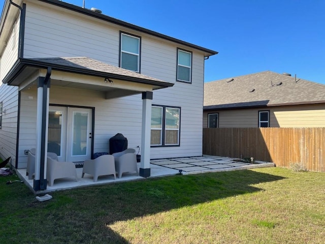 14217 Silver Lace Ln, Pflugerville, TX 78660 - back of house with a patio area and a shingled roof